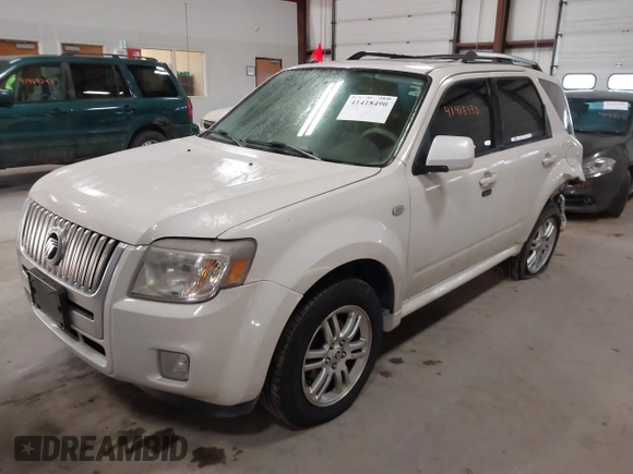 2009 Mercury Mariner Premier with VIN 4M2CU97729KJ00086, listed as a IAAI auction lot 41418490 with 167,486 mi miles. Bid and sale history available at carsss.com. Image 2.