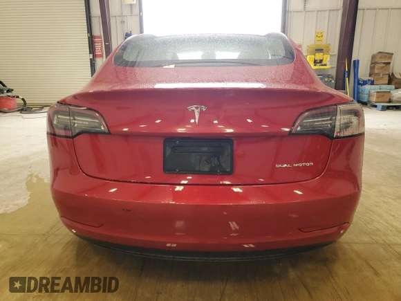 2022 Tesla Model 3 Long Range with VIN 5YJ3E1EBXNF285779, listed as a Copart auction lot 54630135 with 129,097 mi miles and Clean Title. Bid and sale history available at DreamBid. Image 6.