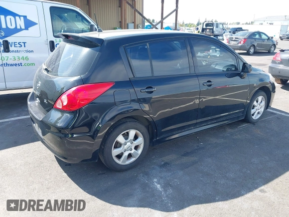 2009 Nissan Versa 1.8 SL with VIN 3N1BC13E99L409145, listed as a IAAI auction lot 42151530 with 150,930 mi miles. Bid and sale history available at carsss.com. Image 4.
