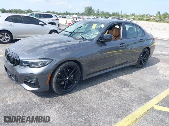2022 BMW 3 Series 330i with VIN 3MW5R1J0XN8C41168, listed as a IAAI auction lot 42322526 with 44,889 mi miles and . Bid and sale history available at DreamBid. Image 2.