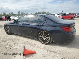 2015 BMW 7 Series 750i with VIN WBAYA8C59FG197642, listed as a Copart auction lot 70282884 with 130,853 mi miles and Salvage title. Bid and sale history available at DreamBid. Image 2.