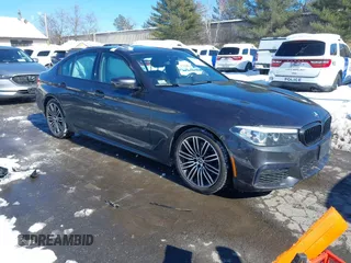 2019 BMW 5 Series 530i xDrive with VIN WBAJA7C50KWW05263, listed as a IAAI auction lot 41571583 with 71,185 mi miles. Bid and sale history available at carsss.com. Image 1.