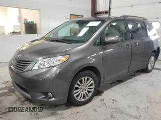 2013 Toyota Sienna XLE AAS with VIN 5TDYK3DC5DS355798, listed as a IAAI auction lot 41884055 with 135,032 mi miles. Bid and sale history available at carsss.com. Image 2.