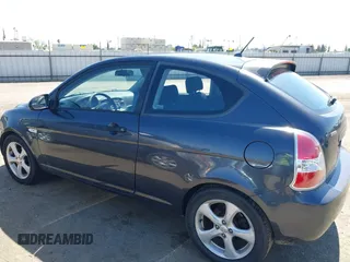 2007 Hyundai Accent SE with VIN KMHCN36C37U031369, listed as a IAAI auction lot 42093760 with 95,919 mi miles. Bid and sale history available at carsss.com. Image 14.