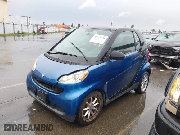 2008 Smart fortwo Pure z VIN WMEEJ31X28K195424, wystawiony jako IAAI lot #41789426 z przebiegiem 136 756 mil mil oraz . Historia ofert i sprzedaży dostępna na DreamBid. Obrazek 2.