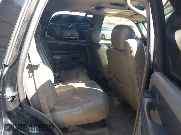 2003 Chevrolet Tahoe LS z VIN 1GNEC13T53J331221, wystawiony jako IAAI lot #42422243 z przebiegiem Nie podano mil oraz . Historia ofert i sprzedaży dostępna na DreamBid. Obrazek 8.