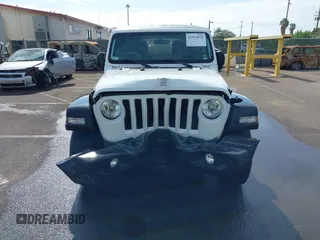 2023 Jeep Wrangler Willys with VIN 1C4HJXDG5PW566145, listed as a IAAI auction lot 41912872 with 50,290 mi miles and . Bid and sale history available at DreamBid. Image 12.