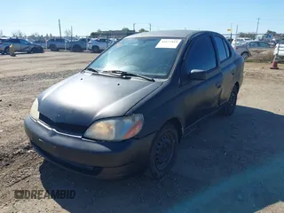 2002 Toyota ECHO with VIN JTDBT123120243848, listed as a IAAI auction lot 41677515 with 287,759 mi miles. Bid and sale history available at carsss.com. Image 2.