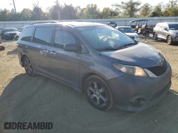 2013 Toyota Sienna SE with VIN 5TDXK3DC8DS310754, listed as a Copart auction lot 74880094 with 337,573 mi miles and Salvage title. Bid and sale history available at DreamBid. Image 4.