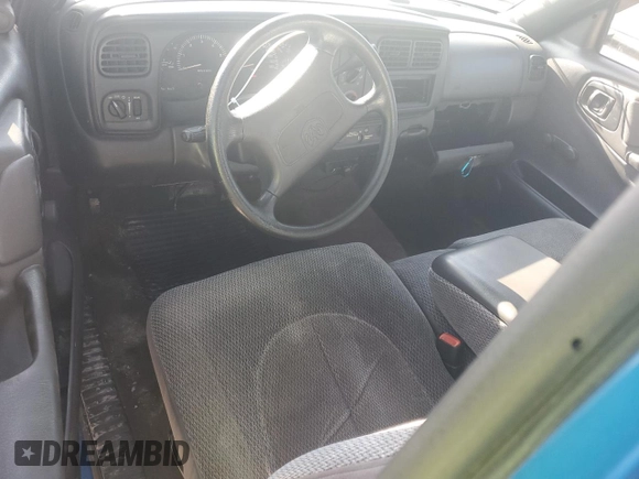 1999 Dodge Dakota SLT z VIN 1B7GL22XXXS179027, wystawiony jako Copart lot #60061285 z przebiegiem 190 075 mil mil oraz Szkoda całkowita • Salvage title. Historia ofert i sprzedaży dostępna na DreamBid. Obrazek 8.