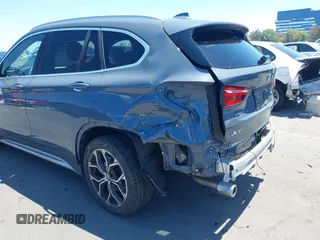 2021 BMW X1 sDrive28i z VIN WBXJG7C02M5T37169, wystawiony jako IAAI lot #42226396 z przebiegiem 48 603 mil mil oraz . Historia ofert i sprzedaży dostępna na DreamBid. Obrazek 6.