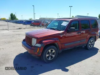 2008 Jeep Liberty Sport with VIN 1J8GN28K38W277986, listed as a IAAI auction lot 42196000 with 175,246 mi miles. Bid and sale history available at carsss.com. Image 2.