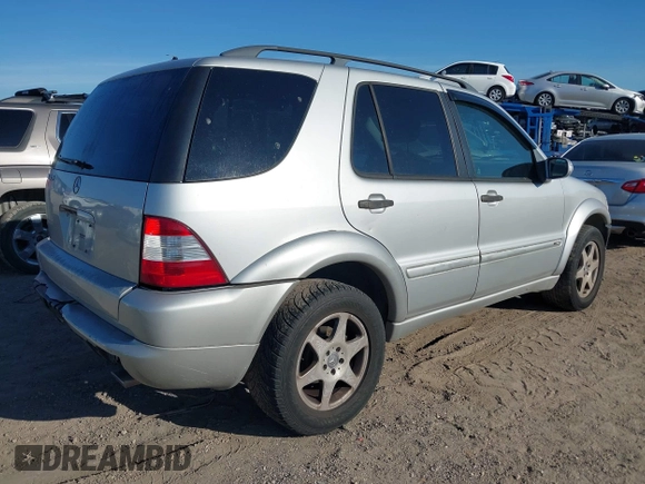 2003 Mercedes-Benz M-Class 3.2L with VIN 4JGAB54E03A383496, listed as a IAAI auction lot 41327756 with 162,973 mi miles. Bid and sale history available at carsss.com. Image 4.