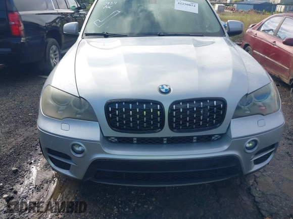 2012 BMW X5 35i z VIN 5UXZV4C56CL749457, wystawiony jako IAAI lot #42250854 z przebiegiem 153 968 mil mil oraz . Historia ofert i sprzedaży dostępna na DreamBid. Obrazek 13.