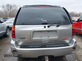 2005 GMC Envoy SLE with VIN 1GKDT13S552332088, listed as a IAAI auction lot 41699178 with 196,869 mi miles. Bid and sale history available at carsss.com. Image 17.