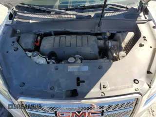 2014 GMC Acadia Denali z VIN 1GKKRTKD9EJ167320, wystawiony jako Copart lot #46899175 z przebiegiem 128 664 mil mil oraz Szkoda całkowita • Salvage title. Historia ofert i sprzedaży dostępna na DreamBid. Obrazek 12.