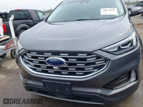 2022 Ford Edge Titanium with VIN 2FMPK4K93NBA14018, listed as a IAAI auction lot 41878548 with 52,515 mi miles. Bid and sale history available at carsss.com. Image 12.