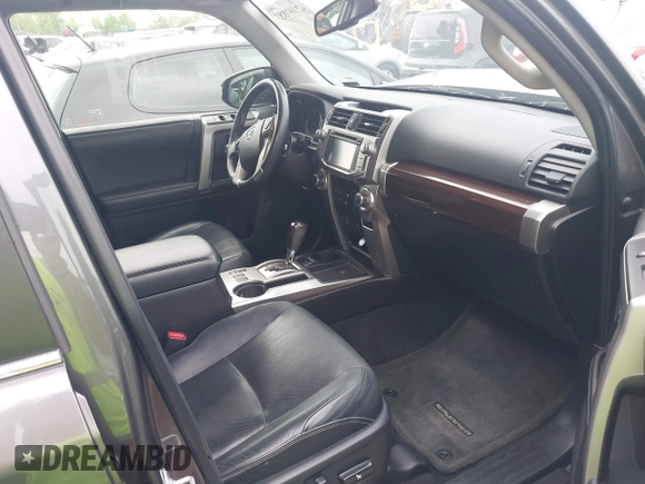 2014 Toyota 4Runner SR5 with VIN JTEZU5JR3E5065811, listed as a IAAI auction lot 42107883 with 283,157 mi miles and . Bid and sale history available at DreamBid. Image 5.