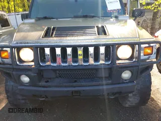 2005 Hummer H2 SUT with VIN 5GRGN22UX5H106653, listed as a IAAI auction lot 42015559 with 180,519 mi miles. Bid and sale history available at carsss.com. Image 6.