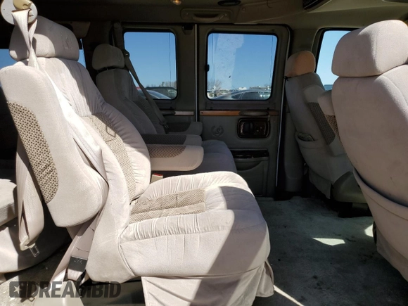 2007 Chevrolet Express Passenger z VIN 1GBFG15T471230597, wystawiony jako Copart lot #46646695 z przebiegiem 154 251 mil mil oraz Szkoda całkowita • Salvage title. Historia ofert i sprzedaży dostępna na DreamBid. Obrazek 11.