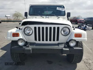 2000 Jeep Wrangler Sahara with VIN 1J4FA59S6YP790541, listed as a Copart auction lot 53837885 with 137,827 mi miles and Salvage title. Bid and sale history available at DreamBid. Image 5.