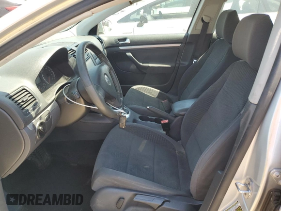 2009 Volkswagen Jetta S with VIN 3VWJZ71K39M149271, listed as a Copart auction lot 64703065 with 214,011 mi miles and Clean title. Bid and sale history available at DreamBid. Image 7.