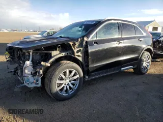 2020 Cadillac XT4 AWD Premium Luxury with VIN 1GYFZDR49LF032597, listed as a Copart auction lot 88595595 with 82,324 mi miles and Salvage Title. Bid and sale history available at carsss.com. Image 1.