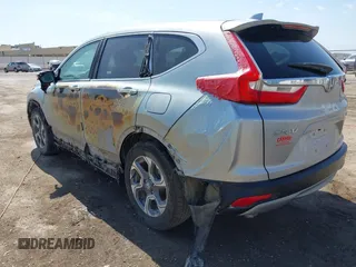 2018 Honda CR-V EX with VIN 7FARW2H59JE059539, listed as a IAAI auction lot 41895078 with 132,631 mi miles and . Bid and sale history available at DreamBid. Image 3.