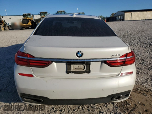 2019 BMW 7 Series 740i с VIN WBA7E2C51KB218262, выставлен на аукционе Copart как лот 52755095 с пробегом 55 082 миль миль и Списание • Salvage title. История ставок и продаж доступна на DreamBid. Изображение 6.