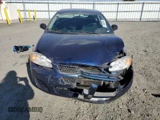 2006 Dodge Stratus SXT z VIN 1B3EL46R46N185788, wystawiony jako Copart lot #71580104 z przebiegiem 104 390 mil mil oraz Szkody całkowita. Historia ofert i sprzedaży dostępna na DreamBid. Obrazek 5.