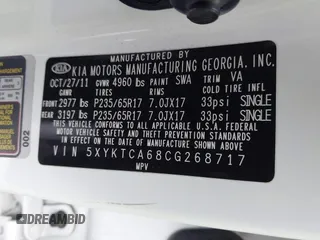 2012 Kia Sorento LX z VIN 5XYKTCA68CG268717, wystawiony jako IAAI lot #42373058 z przebiegiem 171 790 mil mil oraz . Historia ofert i sprzedaży dostępna na DreamBid. Obrazek 9.