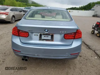 2013 BMW 3 Series 328i xDrive z VIN WBA3B3C53DF541561, wystawiony jako Copart lot #56540965 z przebiegiem 124 840 mil mil oraz Szkoda całkowita • Salvage title. Historia ofert i sprzedaży dostępna na DreamBid. Obrazek 6.