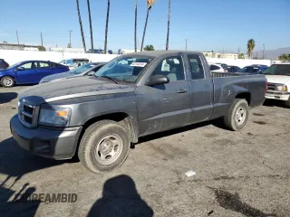 2010 Dodge Dakota z VIN 1D7CE2BK4AS115267, wystawiony jako Copart lot #82154514 z przebiegiem 25 409 mil mil oraz Szkoda całkowita • Salvage title. Historia ofert i sprzedaży dostępna na DreamBid. Obrazek 1.