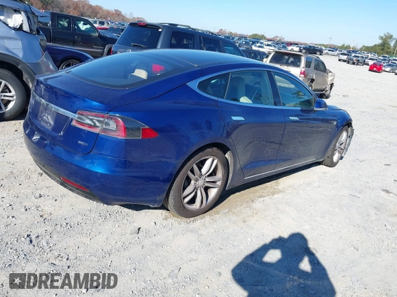 2016 Tesla Model S 90D with VIN 5YJSA1E25GF144614, listed as a IAAI auction lot 40941311 with 83,587 mi miles and . Bid and sale history available at DreamBid. Image 4.