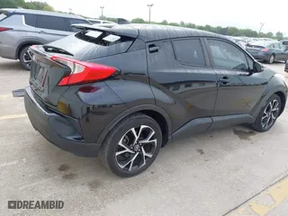 2019 Toyota C-HR XLE with VIN NMTKHMBX2KR094898, listed as a IAAI auction lot 41940883 with 94,351 mi miles. Bid and sale history available at carsss.com. Image 4.