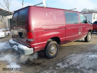 2003 Ford Econoline Cargo Van with VIN 1FTNE24243HB24311, listed as a IAAI auction lot 41404876 with NaN miles. Bid and sale history available at carsss.com. Image 4.