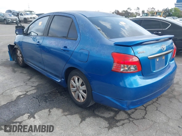 2009 Toyota Yaris with VIN JTDBT903591323255, listed as a IAAI auction lot 41933401 with 88,558 mi miles and . Bid and sale history available at DreamBid. Image 3.
