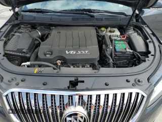 2014 Buick LaCrosse Leather with VIN 1G4GB5G39EF177040, listed as a Copart auction lot 54257695 with 128,690 mi miles and Salvage Title. Bid and sale history available at DreamBid. Image 11.