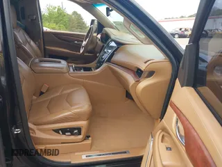 2016 Cadillac Escalade Platinum z VIN 1GYS3DKJ7GR374845, wystawiony jako IAAI lot #41951693 z przebiegiem 93 820 mil mil oraz . Historia ofert i sprzedaży dostępna na DreamBid. Obrazek 5.