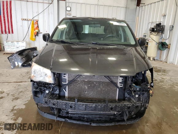 2012 Dodge Grand Caravan SXT with VIN 2C4RDGCG0CR191037, listed as a Copart auction lot 50930675 with 142,093 mi miles and Salvage Title. Bid and sale history available at DreamBid. Image 5.