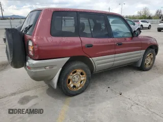 2000 Toyota RAV4 z VIN JT3HP10V2Y7162705, wystawiony jako Copart lot #54268515 z przebiegiem 310 778 mil mil oraz Czysty tytuł • Clean title. Historia ofert i sprzedaży dostępna na DreamBid. Obrazek 3.