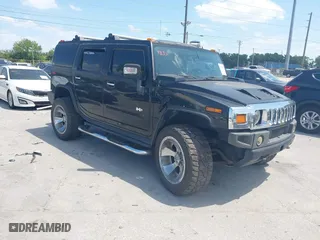2005 Hummer H2 SUV with VIN 5GRGN23U05H128370, listed as a IAAI auction lot 41919539 with 278,023 mi miles. Bid and sale history available at carsss.com. Image 1.