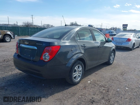 2016 Chevrolet Sonic LT z VIN 1G1JC5SH1G4185750, wystawiony jako IAAI lot #38799488 z przebiegiem 170 067 mil mil oraz . Historia ofert i sprzedaży dostępna na DreamBid. Obrazek 4.