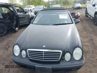 1999 Mercedes-Benz CLK with VIN WDBLK65G1XT013704, listed as a IAAI auction lot 42115880 with 85,741 mi miles. Bid and sale history available at carsss.com. Image 12.