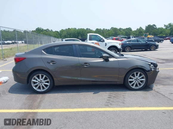 2017 Mazda 3 Touring with VIN 3MZBN1V74HM142735, listed as a IAAI auction lot 42395462 with 137,543 mi miles and . Bid and sale history available at DreamBid. Image 13.