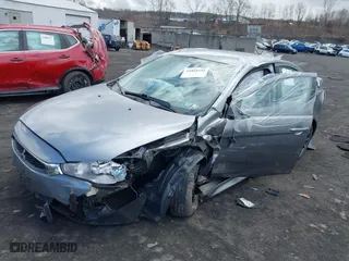2017 Mitsubishi Lancer ES with VIN JA32U2FU7HU000552, listed as a IAAI auction lot 41868342 with 136,132 mi miles. Bid and sale history available at carsss.com. Image 2.