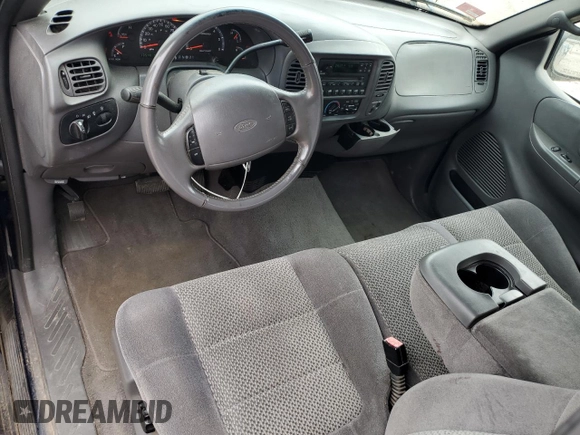 2002 Ford F-150 XL z VIN 1FTRX18L02NA96421, wystawiony jako Copart lot #64867095 z przebiegiem 135 401 mil mil oraz Czysty tytuł • Clean title. Historia ofert i sprzedaży dostępna na DreamBid. Obrazek 8.
