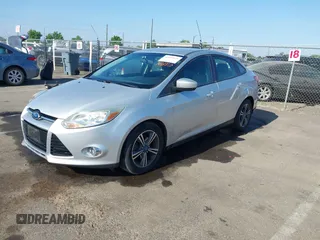2012 Ford Focus SE z VIN 1FAHP3F28CL215997, wystawiony jako IAAI lot #42483639 z przebiegiem 101 518 mil mil oraz . Historia ofert i sprzedaży dostępna na DreamBid. Obrazek 17.