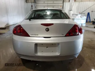 2001 Mercury Cougar z VIN 1ZWFT61LX15601779, wystawiony jako Copart lot #72073124 z przebiegiem 121 192 mil mil oraz Szkody całkowita. Historia ofert i sprzedaży dostępna na DreamBid. Obrazek 6.