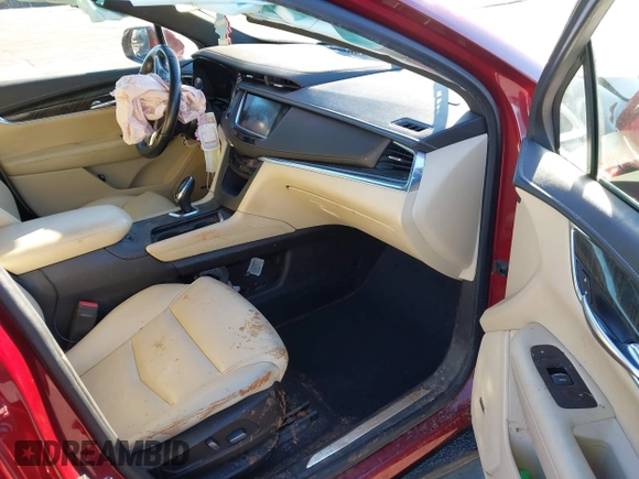 2018 Cadillac XT5 FWD with VIN 1GYKNARS4JZ211455, listed as a IAAI auction lot 41257536 with 102,032 mi miles and . Bid and sale history available at DreamBid. Image 5.